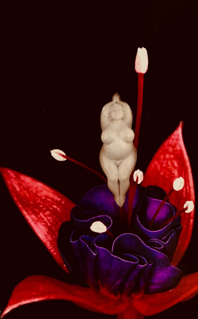 Yogic woman statue in fuchsia flower